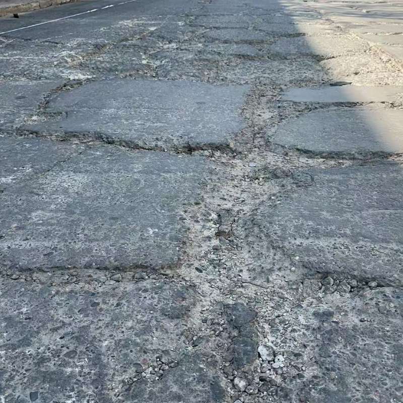 南城路面起砂露石子修补料